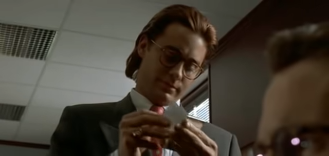 Paul Allen unveiling his business card (and yes that is a young Jared Leto) // Credit: American Psycho, Lionsgate films