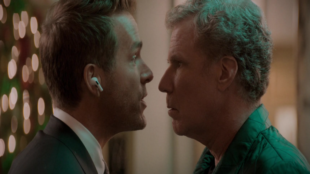 Ryan Reynolds as Clint Briggs and Will Farrell as The Ghost of Christmas Present in Spirited