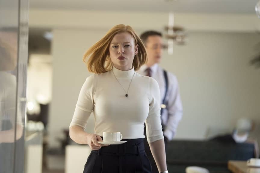 Shiv Roy with her husband in the background and out of focus, which is fitting // Credit: Succession, HBO