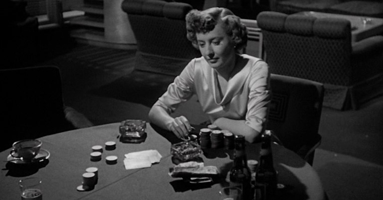 Barbara Stanwyck is heartbreaking as the addicted Joan // Credit: Universal