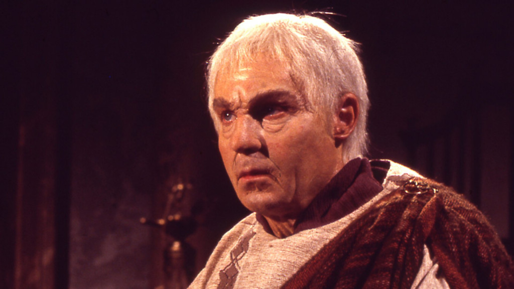 Derek Jacobi as Claudius as an old man, writing the history of his family