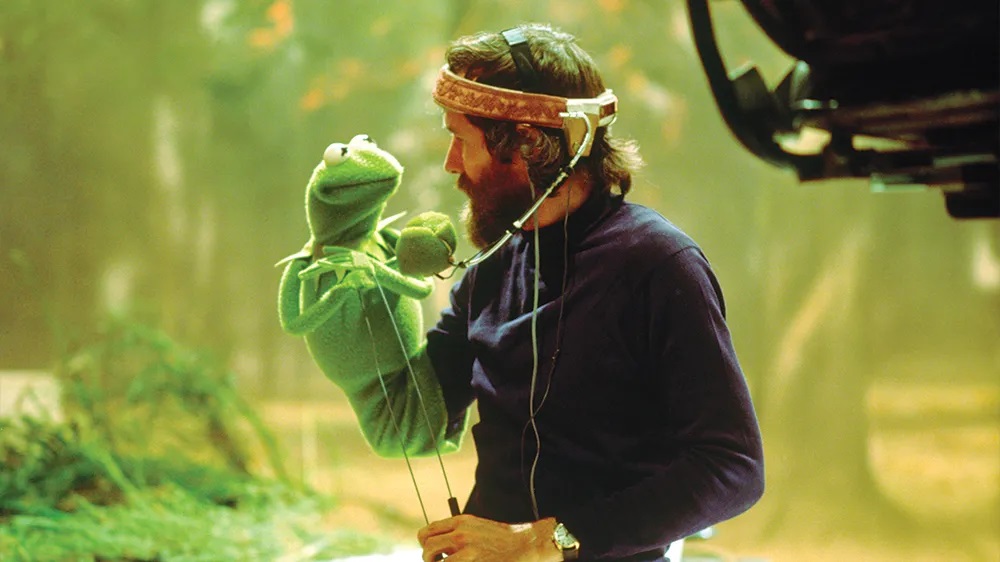 Jim Henson bringing life to his iconic Kermit the Frog // Credit: Jim Henson Company